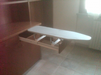 Accessorio a scomparsa per stiro